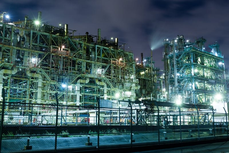 Petrochemical refinery illuminated at night