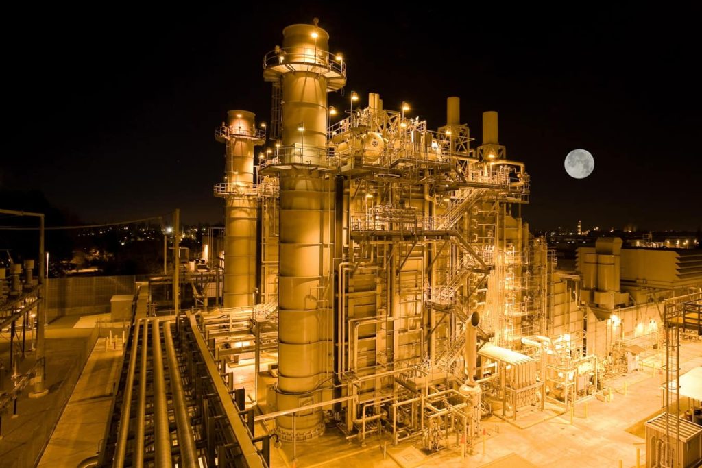 Stacks and scaffoldings at an industrial plant, where efficiency of turbomachinery is critical