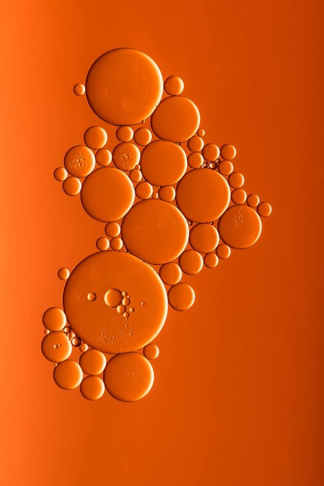 Steam turbine oil bubbles on an orange background