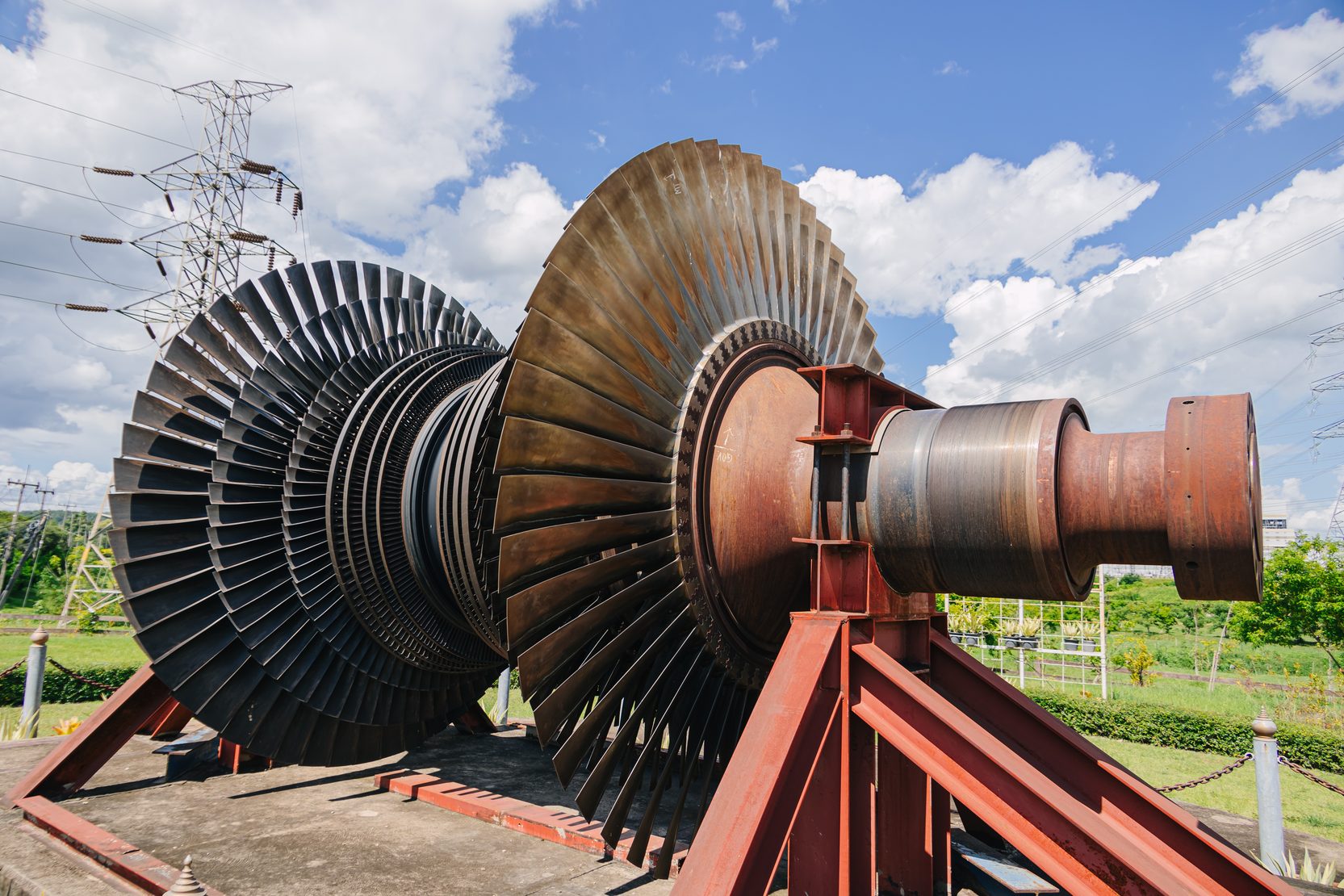 Steam turbine rotor and generator at a power plant